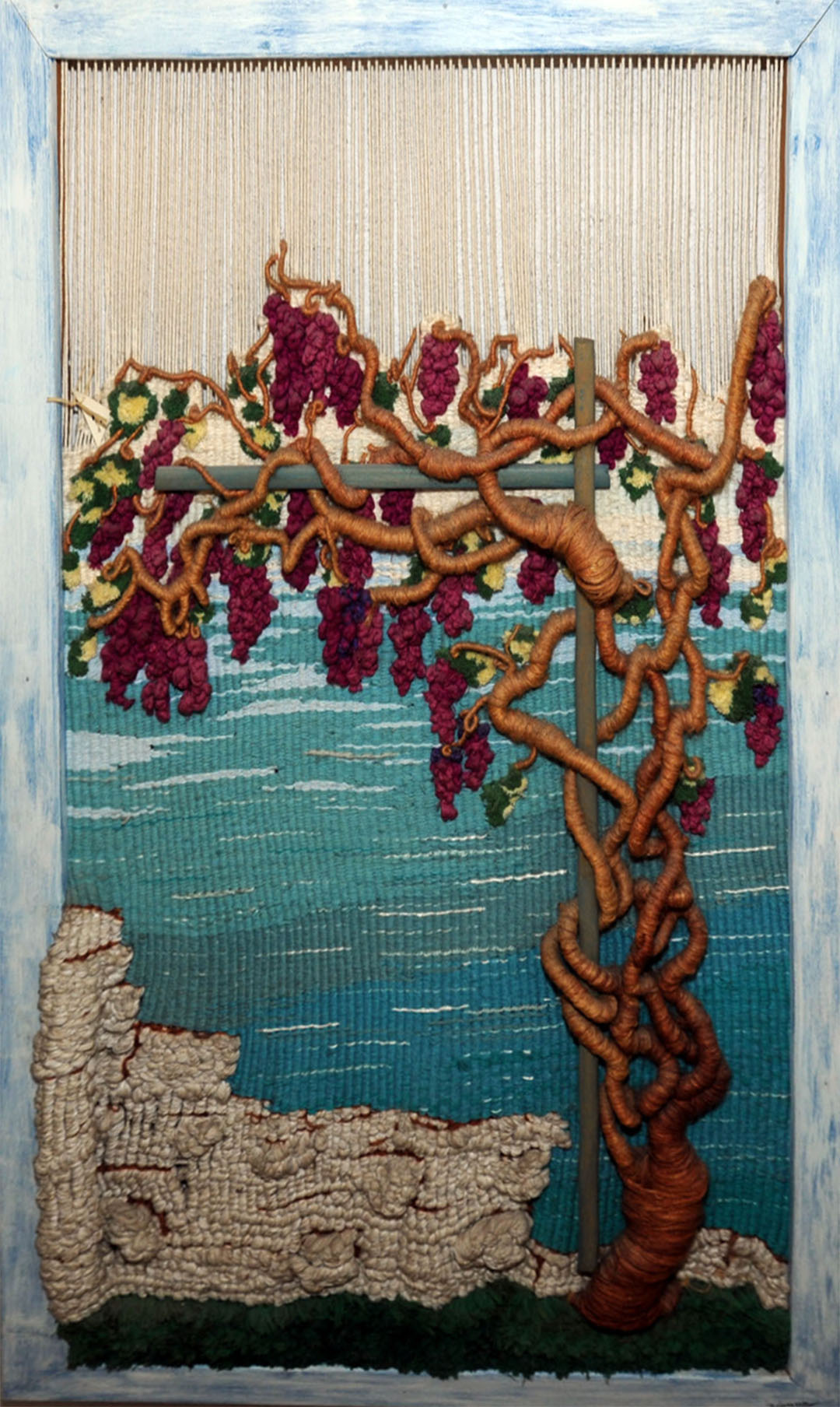 PARRA tapiz realizado con hilos de algodón. Tamaño 110x70 cms. Enmarcado en bastidor